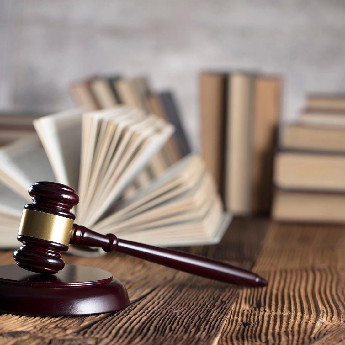 gavel with books old wooden desk